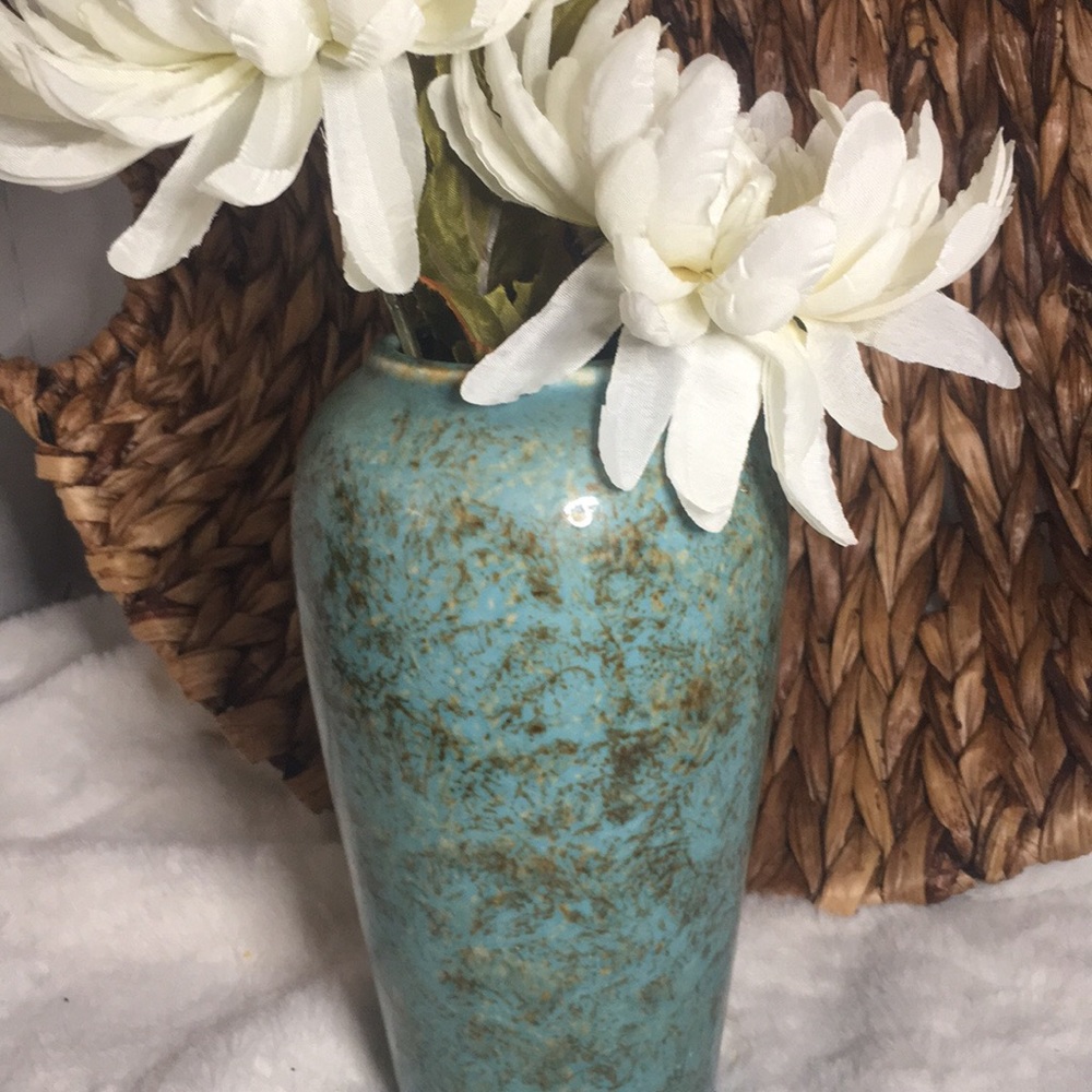 Beautiful turquoise vase with brown and gold flex or brushstrokes.